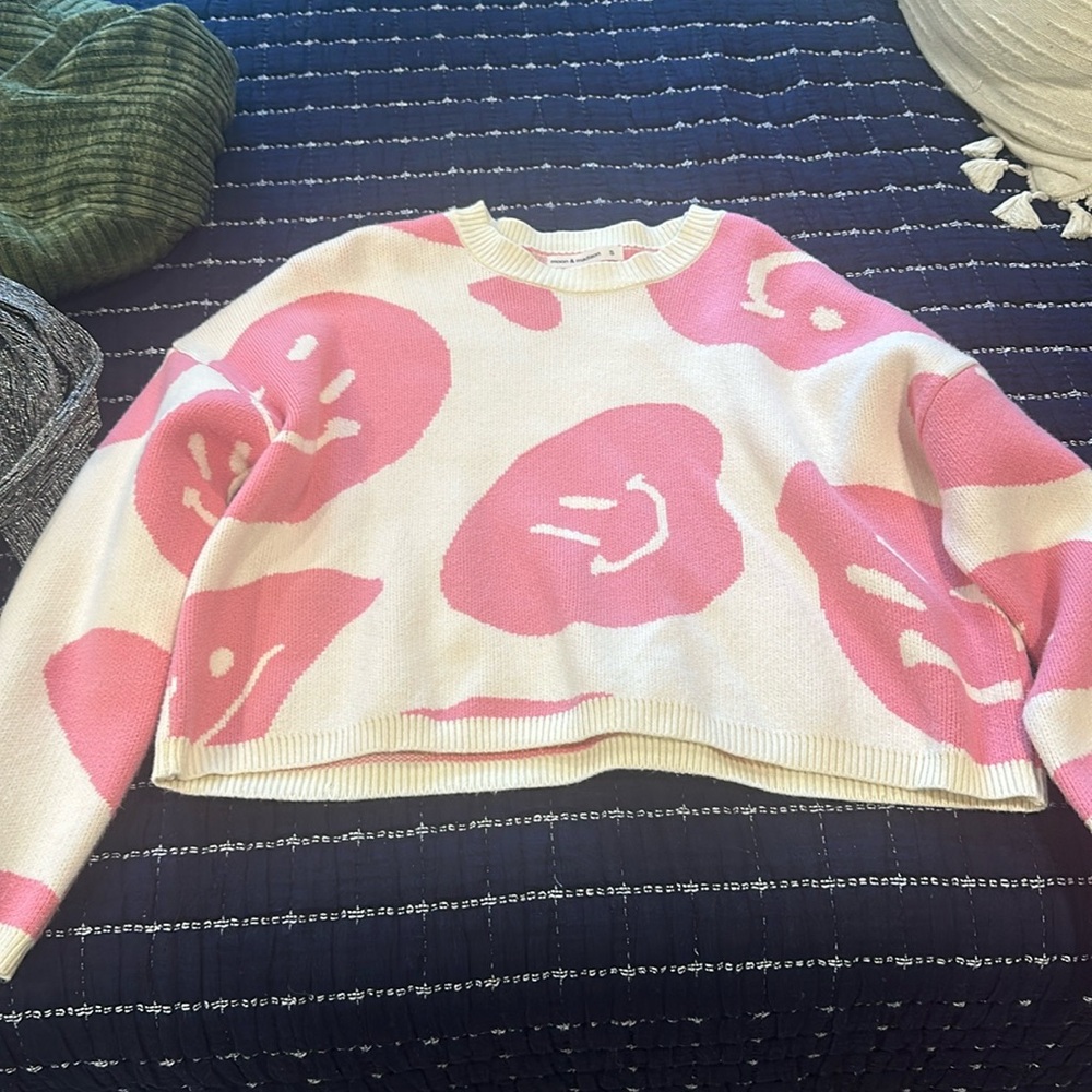 Pink smiley face sweater